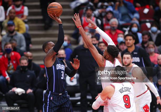 Orlando Magic guard Terrence Ross shoots the ball over Chicago Bulls forward Troy Brown Jr. During a NBA game between the Orlando Magic and the...