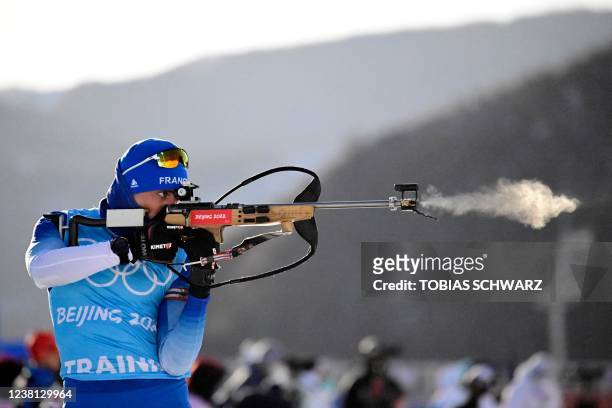 France's Simon Desthieux trains at the shooting range during a biathlon practice session at the National Biathlon Centre in Zhangjiakou on February 2...