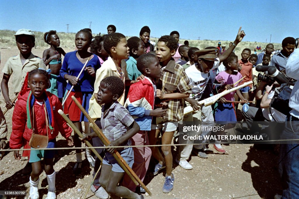 Swapo Rally Children play with dummu guns as thousands of South West Africa... News ...