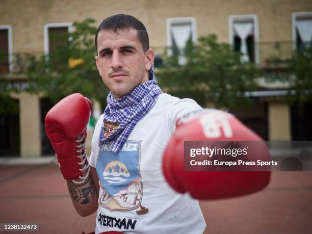 Mikel Fernandez poses for the photo with his Muay Thai gloves and the belt that accredit him as Champion of Spain on May 31, 2020 in Pamplona,...