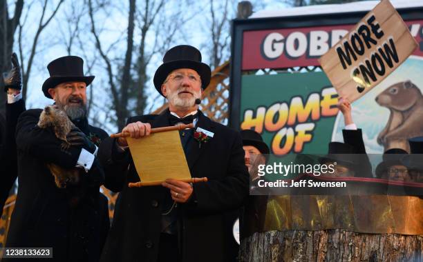 Groundhog handler AJ Derume holds Punxsutawney Phil, who saw his shadow, predicting a late spring during the 136th annual Groundhog Day festivities...