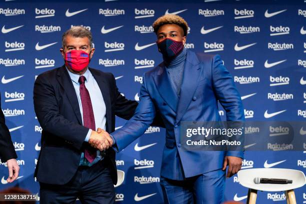The president Joan Laporta and Adama Traore during the presentation of the player as a new signing for FC Barcelona, in Barcelona, Spain, on 02th...