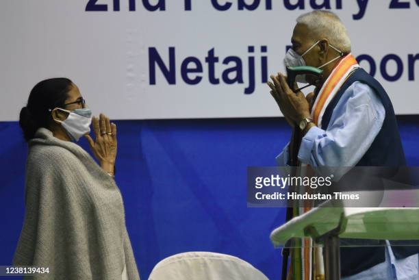 All India Trinamool Congress chief and West Bengal Chief Minister Mamata Banerjee greets party leader Yashwant Sinha during a media interaction after...