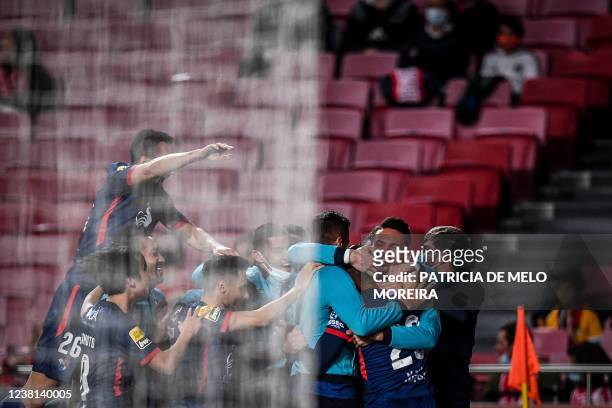 Gil Vicente's Brazilian forward Samuel Lino celebrates with his teammates after scoring a goal during the Portuguese league football match between SL...