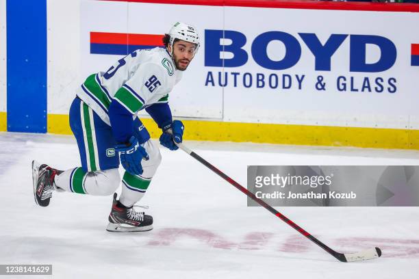 Justin Bailey of the Vancouver Canucks follows the play up the ice during third period action against the Winnipeg Jets at Canada Life Centre on...