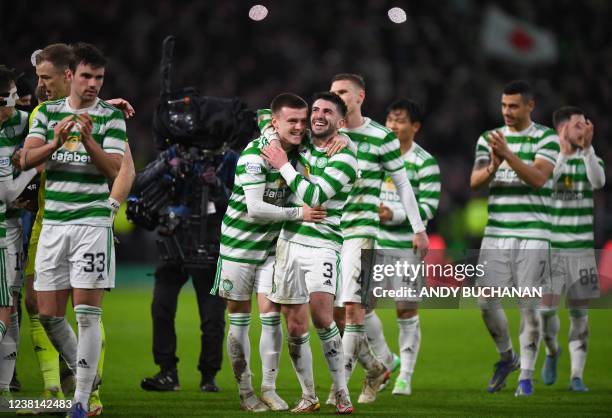 Players celebrate after the Scottish Premiership football match between Celtic and Rangers at Celtic Park stadium in Glasgow, Scotland on February 2,...