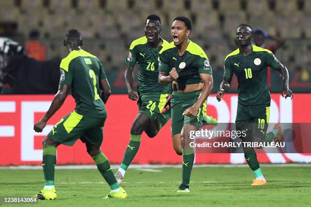 Senegal's defender Abdou Diallo celebrates after scoring his team's first goal during the Africa Cup of Nations 2021 semi final football match...