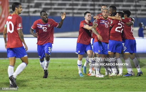 Costa Rica's Joel Campbell celebrates with teammates after scoring a goal during the World Cup Qualifier CONCACAF match between Jamaica and Costa...