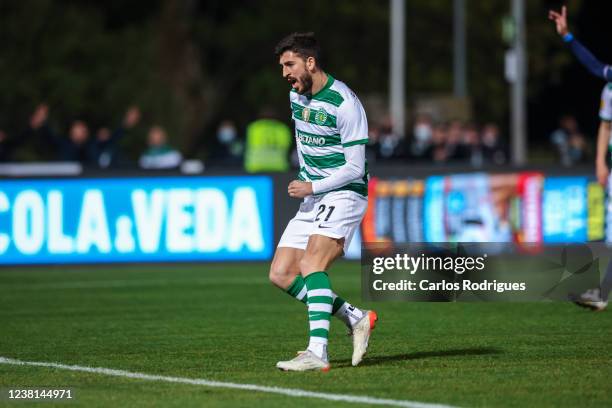 Paulinho of Sporting CP celebrates after scoring the first goal of his team during the Liga Portugal Bwin match between Belenenses SAD and Sporting...