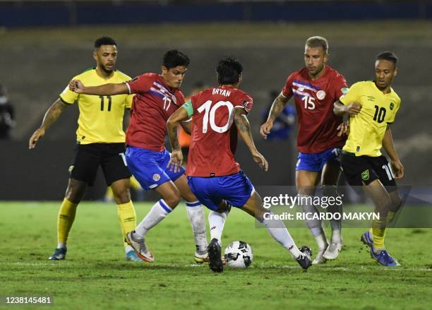 From left Jamaica's Andre Gray, Costa Rica's Yeltsin Tejeda, Bryan Ruiz, Francisco Calvo and Jamaica's Bobby Reid vie for the ball during the World...