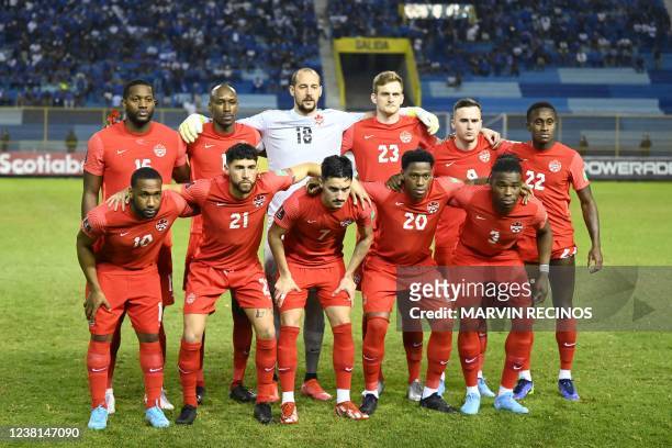 Canada's football team pose for photos ahead of the FIFA World Cup Concacaf qualifier football match between El Salvador and Canada at Cuscatlan...