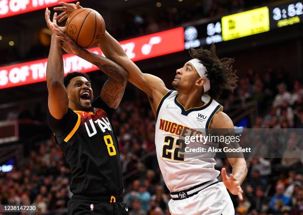 Rudy Gay of the Utah Jazz attempts a shot over Zeke Nnaji of the Denver Nuggets during the first half of a game at Vivint Smart Home Arena on...