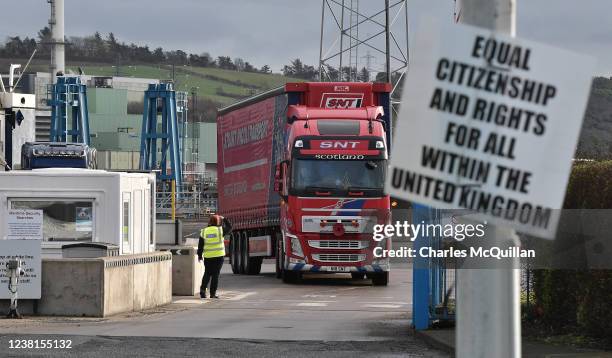 Freight and goods lorries disembark from the Cairnryan, Scotland to Larne, Northern Ireland ferry without goods checks by customs officials on...
