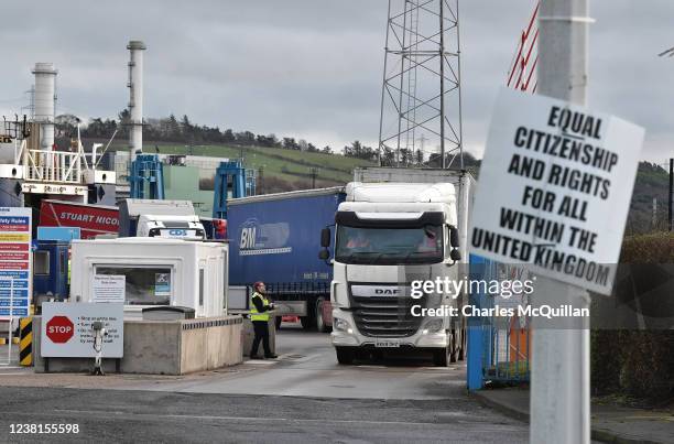 Freight and goods lorries disembark from the Cairnryan, Scotland to Larne, Northern Ireland ferry without goods checks by customs officials on...