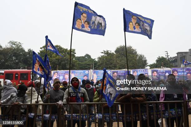 Supporters listen to Bahujan Samaj Party president Mayawati during an election rally in Ghaziabad in the northern Indian state of Uttar Pradesh on...