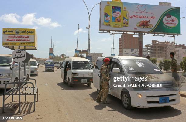 Fighters affiliated with Yemen's separatist Southern Transitional Council man a checkpoint as they deploy amid tensions in the southern port city of...
