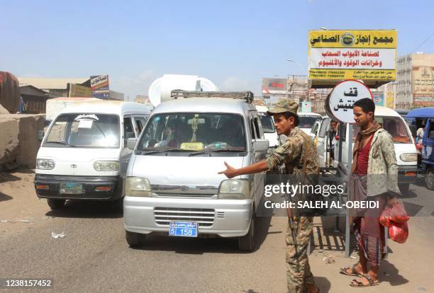 Fighters affiliated with Yemen's separatist Southern Transitional Council man a checkpoint as they deploy amid tensions in the southern port city of...