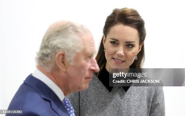 Britain's Prince Charles, Prince of Wales talks with Britain's Catherine, Duchess of Cambridge, during their visit to The Prince's Foundation's...