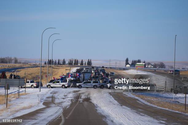 Protesters attempting to reach the U.S.-Canada border at a police blockade 15 miles north of Coutts, Alberta, Canada, on Wednesday, Feb 2, 2022....
