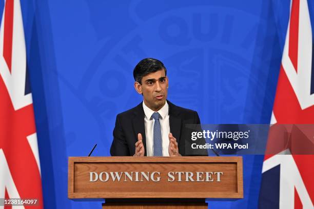 Britain's Chancellor of the Exchequer Rishi Sunak hosts a press conference in the Downing Street Briefing Room on February 3, 2022 in London,...