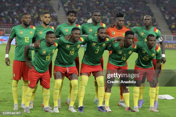 Players of Cameroon pose for a team photo before the Africa Cup of Nations 2021 semi-final football match between Cameroon and Egypt at Stade...