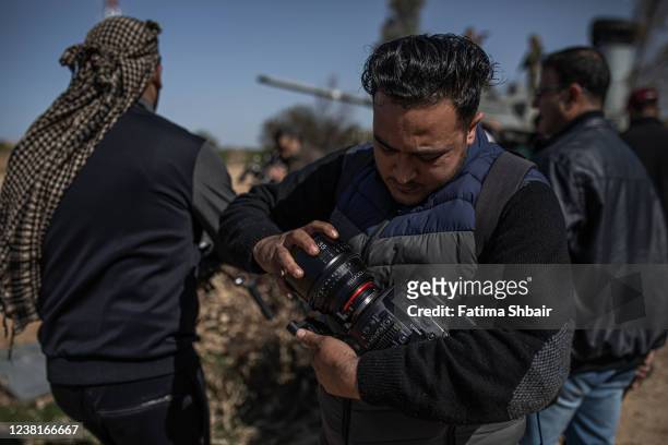 Palestinian actors and crew shoot a scene for the series "Qabdat al-Ahrar," meaning "Fist of the Free" in Arabic, in Beit Lahia in the northern Gaza...