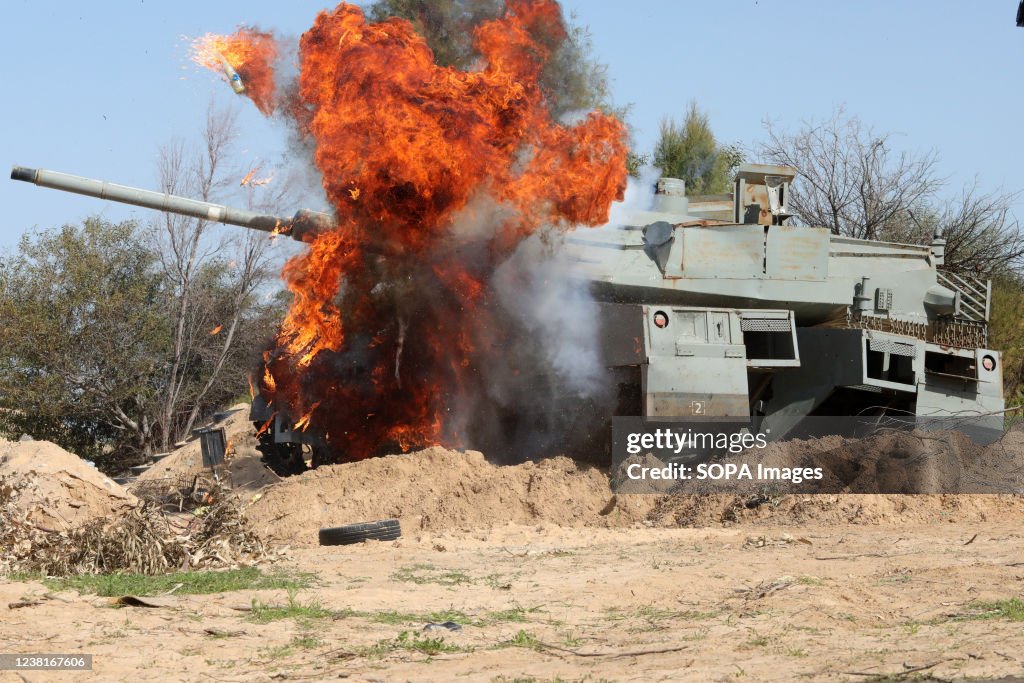 Tank Exploting An explosion seen next to a fake Israeli tank during the shooting. A ...