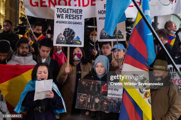 Hongkongers, Tibetans, Uyghur Muslims, their Tigrayan allies and supporters protest in Piccadilly Circus on the eve of Beijing 2022 Winter Olympic...