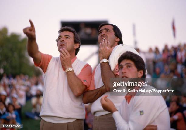 Non-playing captain Tony Jacklin with Seve Ballesteros and Jose Maria Olazabal of Team Europe look on during the final match of the afternoon...