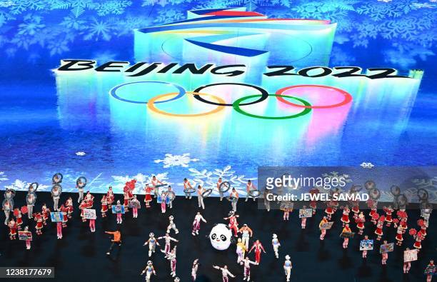 Performers dance in a pre-show ahead of the opening ceremony of the Beijing 2022 Winter Olympic Games, at the National Stadium, known as the Bird's...