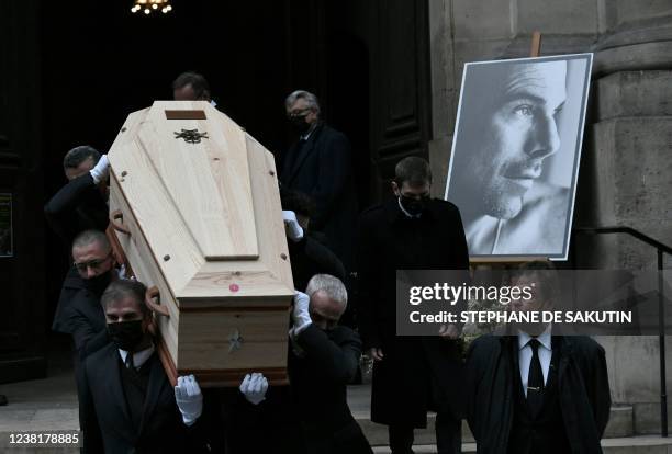 Pallbearers carry the coffin of late French designer Thierry Mugler at the protestant church of the Oratory of the Louvre in Paris on February 4 at...