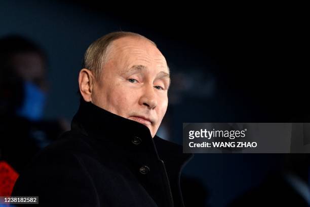 Russia's President Vladimir Putin looks on during the opening ceremony of the Beijing 2022 Winter Olympic Games, at the National Stadium, known as...