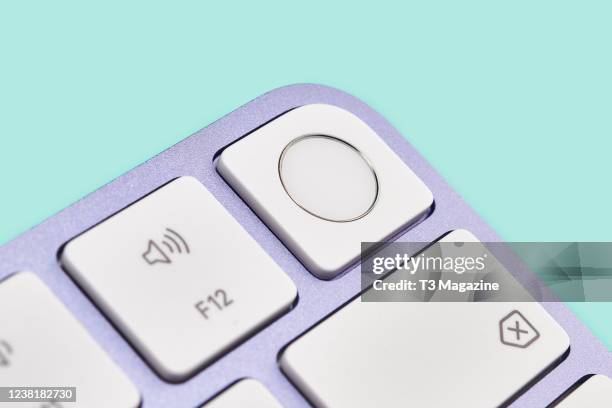 Detail of the Touch ID fingerprint scanner on an M1-compatible Apple Magic keyboard, taken on May 14, 2021.