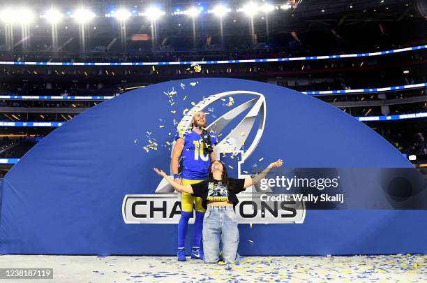 Inglewood, California January 30, 2022: Rams receiver Cooper Kupp celebrates with wife Anna after defeating the 49ers in the NFC Championship at SoFi...