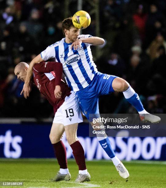 Kilmarnock's Ash Taylor and Arbroath's Craig Wighton in action during a cinch Championship match between Arbroath and Kilmarnock at Gayfield Park, on...