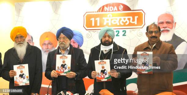 National Democratic Alliance members MP Sukhdev Singh Dhindsa, Union Minister Hardeep Singh Puri, Punjab ex Chief minister Captain Amarinder Singh...