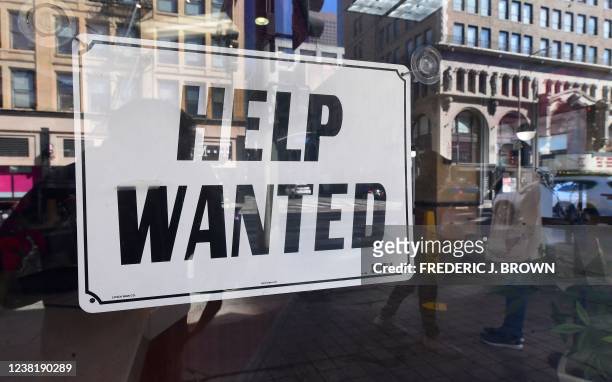 Help wanted' sign is posted in front of restaurant on February 4, 2022 in Los Angeles, California. The United States added an unexpectedly robust...