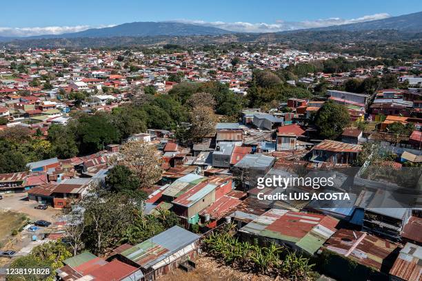 Aerial view of El Erizo low-income neighbourhood and the modern neighbourhood of Ciruelas , in the province of Alajuela, Costa Rica, on January 4,...