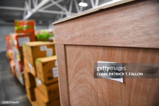 Made in China' sticker is seen on a shipping crate of items seized by US Customs and Border Protection for further inspection during a press...