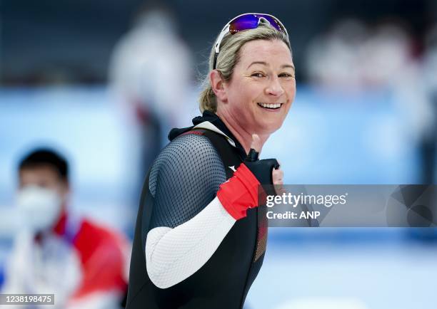 Claudia Pechstein raises her thumbs after completing the 3000m track during the first day of the 2022 Winter Olympics at the National Speed Skating...