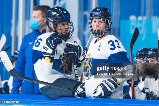 Petra Nieminen of Finland and Michelle Karvinen of Finland looks dejected at the match between Canada vs. Finland during the Beijing 2022 Winter...