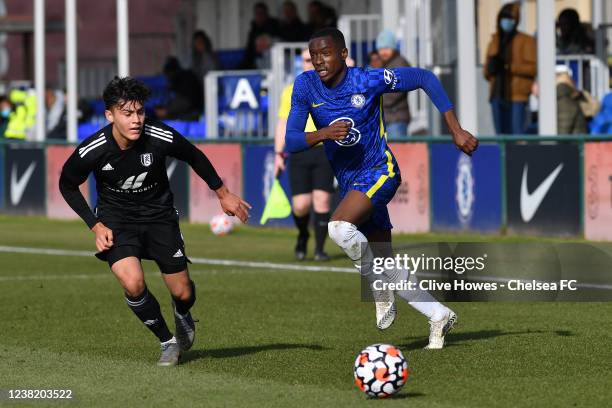 Derrick Abu of Chelsea runs with the ball during the Chelsea v Fulham U18 Premier League match at Chelsea Training Ground on February 5, 2022 in...