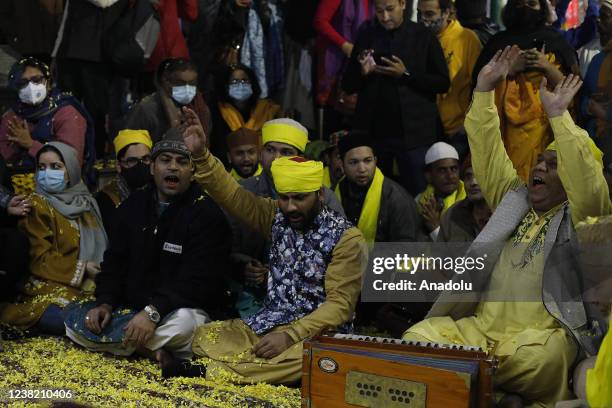 Devouts celebrate Basant Panchami at Nizamuddin Dargah in New Delhi on February 05, 2022.Every year Sufi Basant falls on the third day of Jumada...