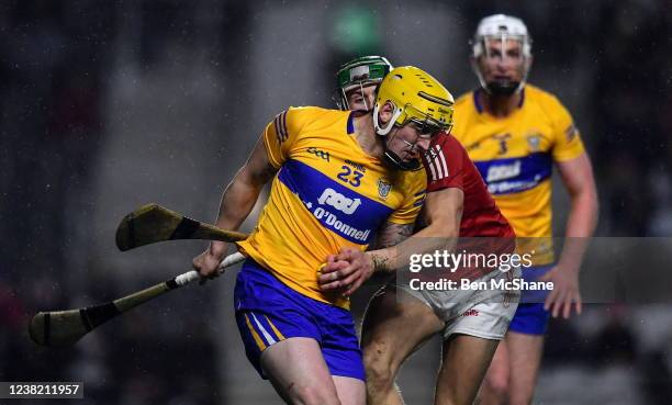 Cork , Ireland - 5 February 2022; Aaron Fitzgerald of Clare in action against Alan Cadogan of Cork during the Allianz Hurling League Division 1 Group...