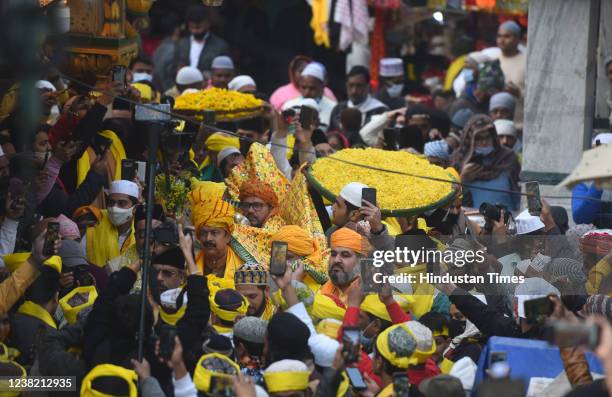 Devotees offer prayers at Nizamuddin Dargah on the occasion of Basant Panchami, on February 5, 2022 in New Delhi, India.