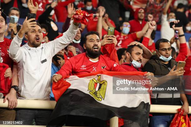 Fans of Al Ahly SC holdling the national flag of Egypt during the FIFA Club World Cup UAE 2021 2nd Round match between Al Ahly SC and CF Monterrey at...