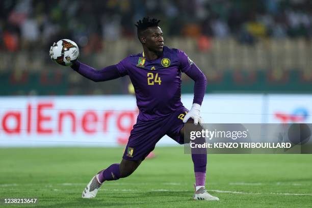 Cameroon's goalkeeper Andre Onana holds the ball during the Africa Cup of Nations 2021 third place football match between Burkina Faso and Cameroon...