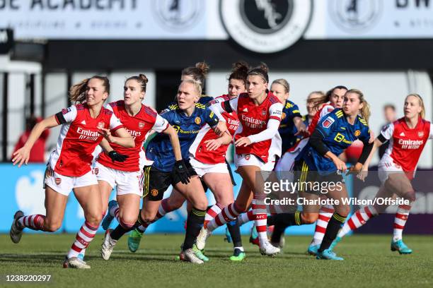 Lia Walti and Vivianne Miedema of Arsenal, Maria Thorisdottir of Man Utd and Steph Catley of Arsenal run into the box during the Barclays FA Women's...
