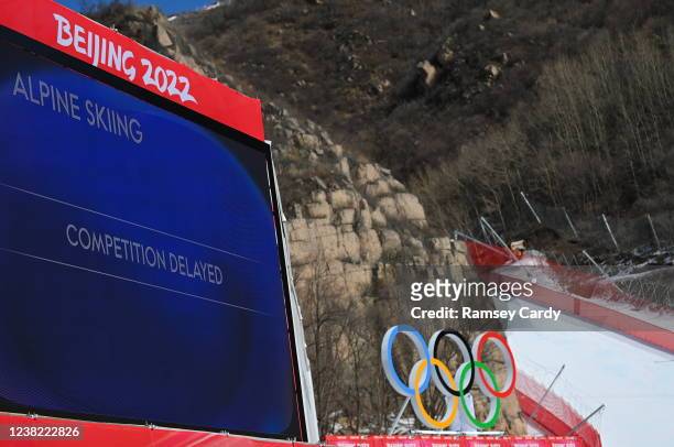 Yanqing , China - 6 February 2022: A screen at the venue indicating the competition is delayed due to high winds before the Men's Downhill Skiing...