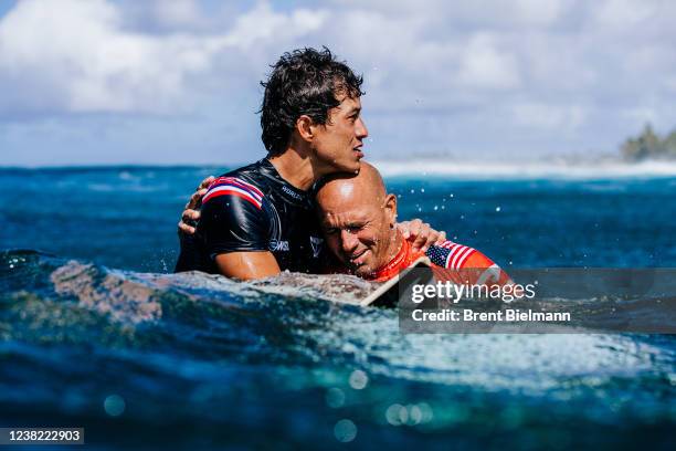 Seth Moniz of Hawaii and Eleven-time WSL Champion Kelly Slater of the United States after winning the Final at the Billabong Pro Pipeline on February...